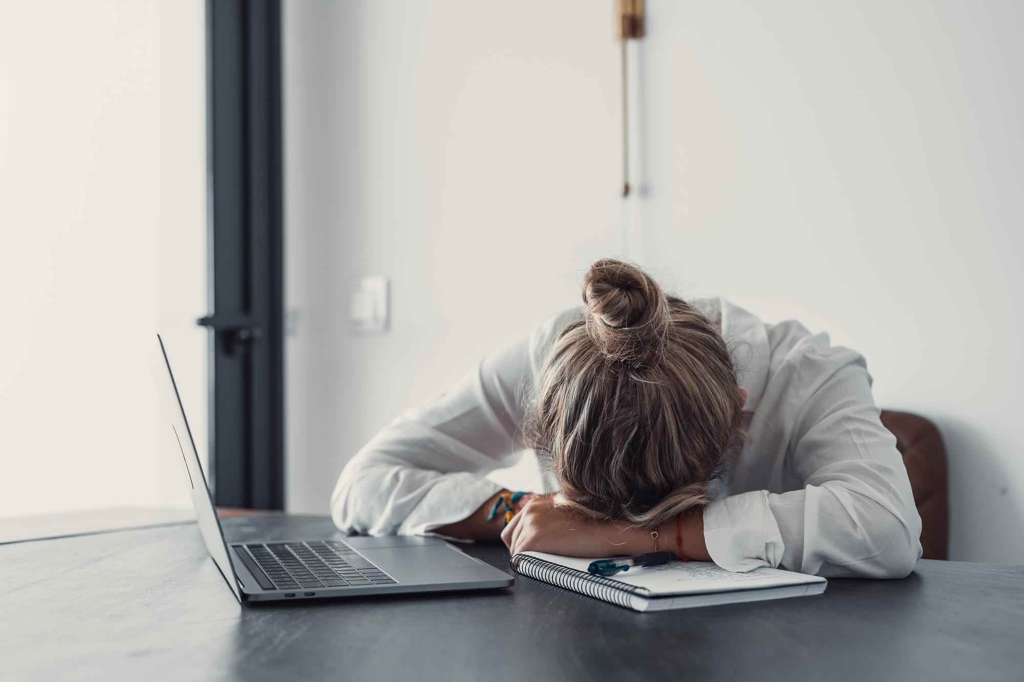 young-woman-using-laptop-home