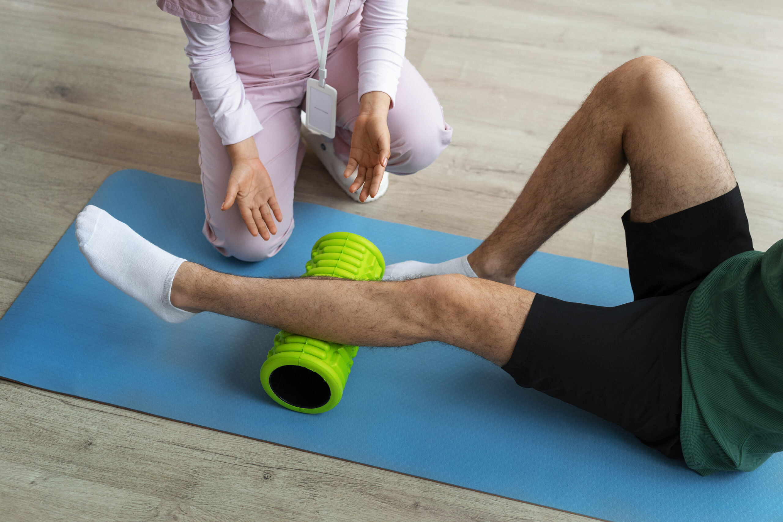 doctor-helping-patient-rehabilitation