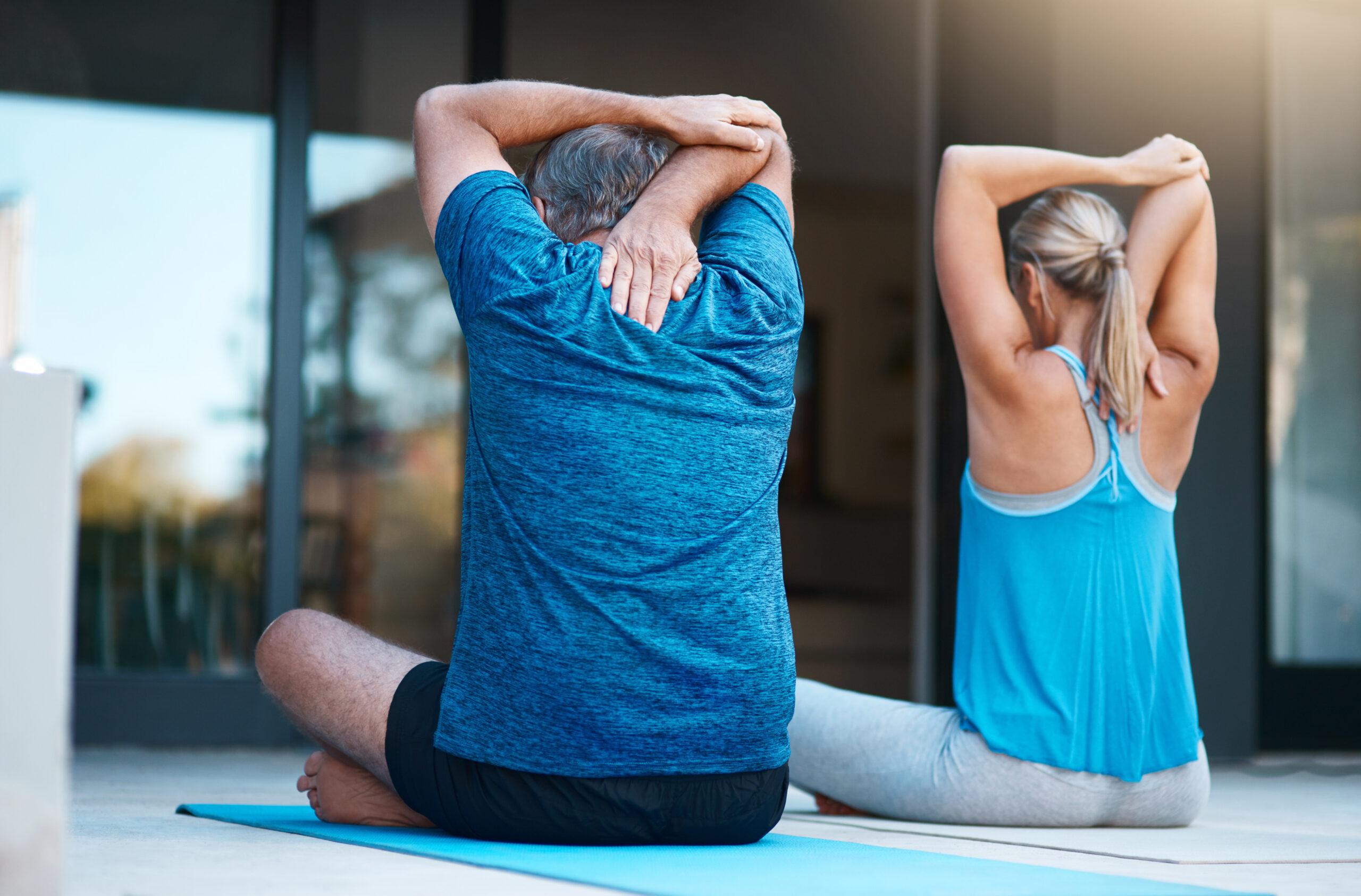 mature-couple-stretching-arms-yoga-warm-up-exercise-daily-routine-mindfulness-mobility-man-woman-back-outdoor-wellness-stress-relief-balance-flexibility