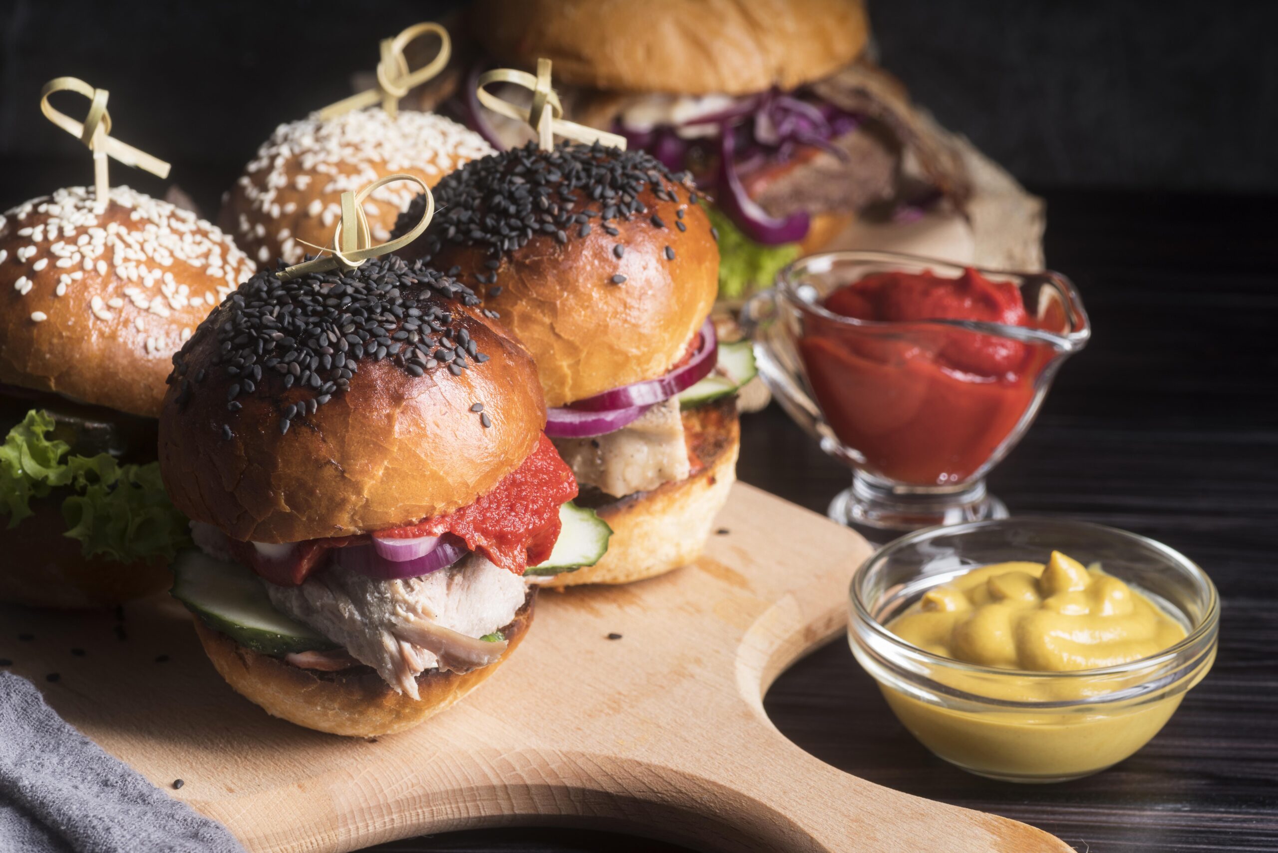 delicious-looking-hamburgers-wooden-board